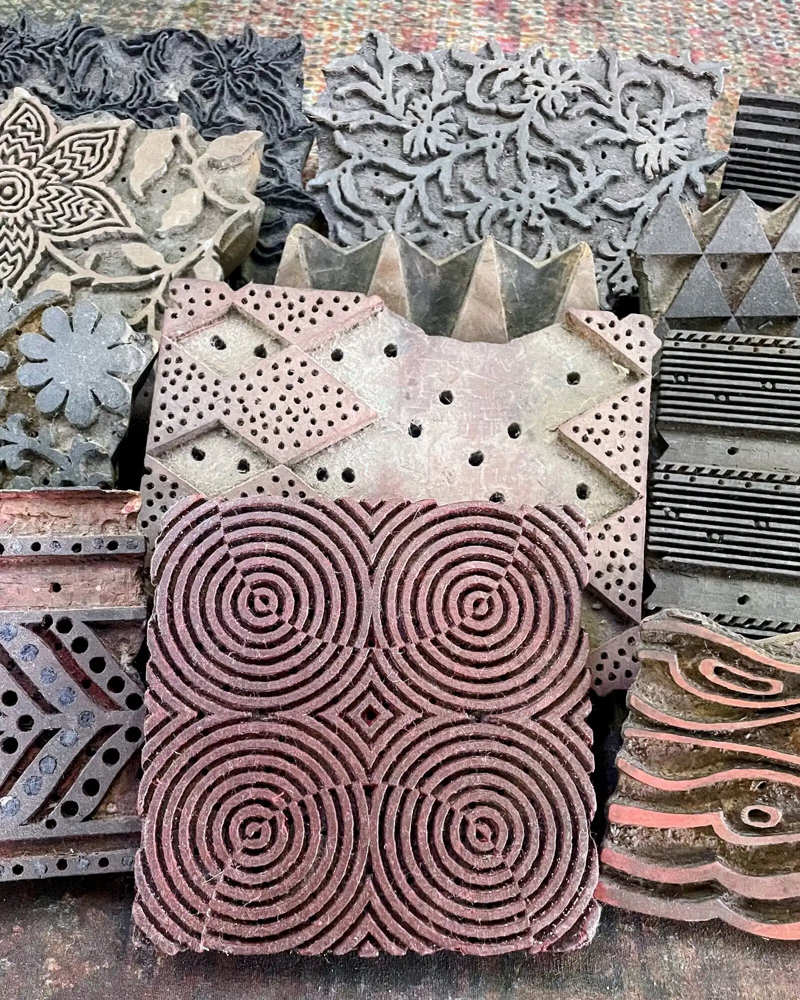 Carved wooden blocks with floral and geometric motifs