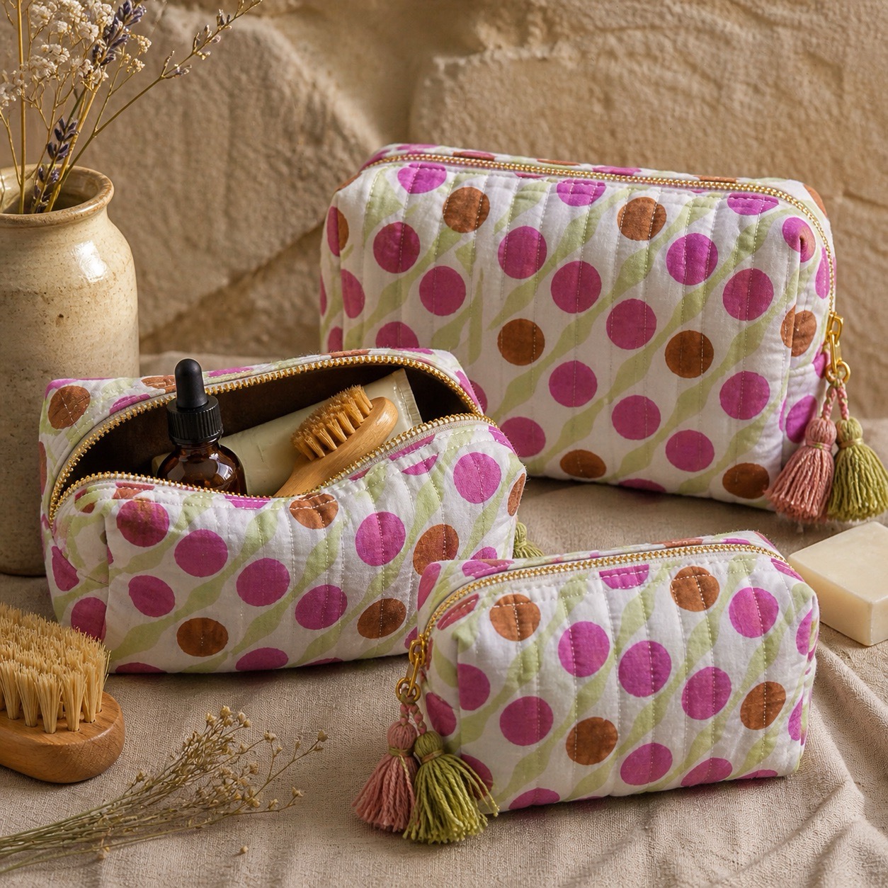 Coordinated quilted toiletry bag set in a graphic dot print
