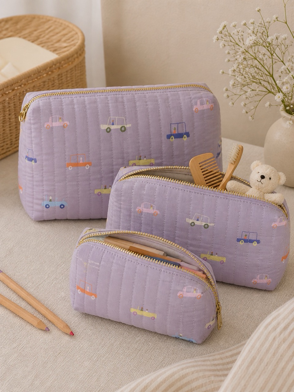 Set of quilted children's pouches in a lilac car print